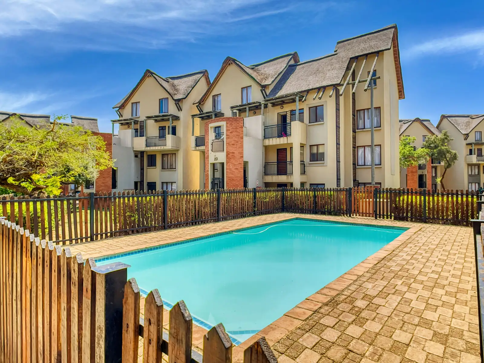 Apartment complex with a swimming pool